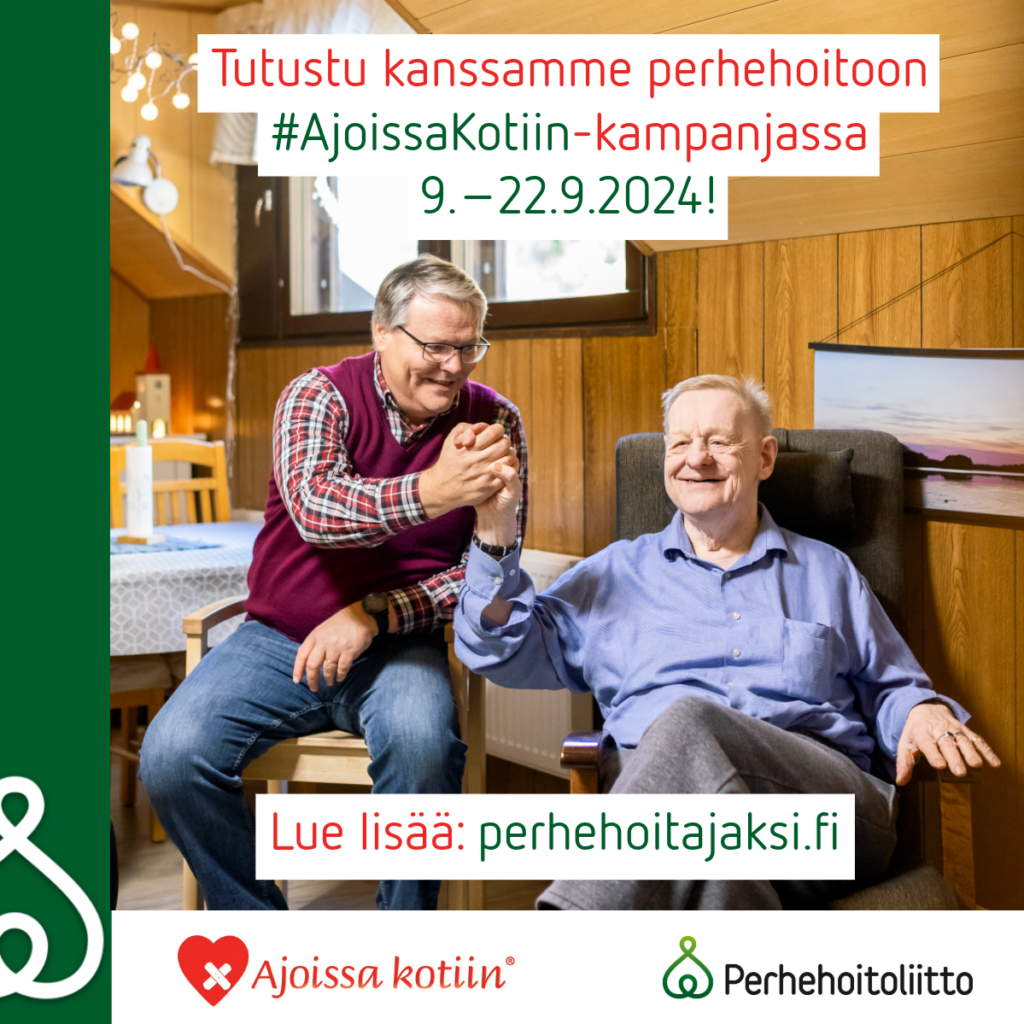 Kaksi miestä istuu huoneessa ja pitelee toisiaan kädestä.