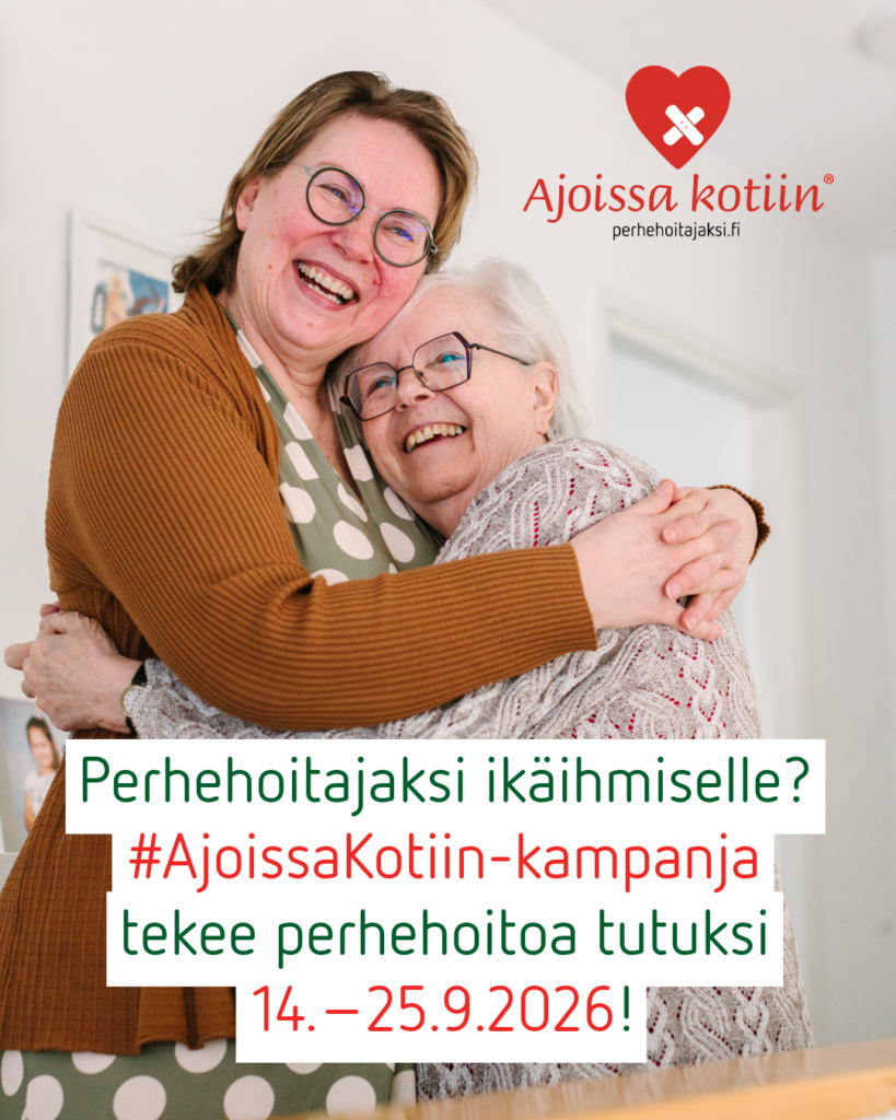 Kaksi silmälasipäistä naista halaa.
