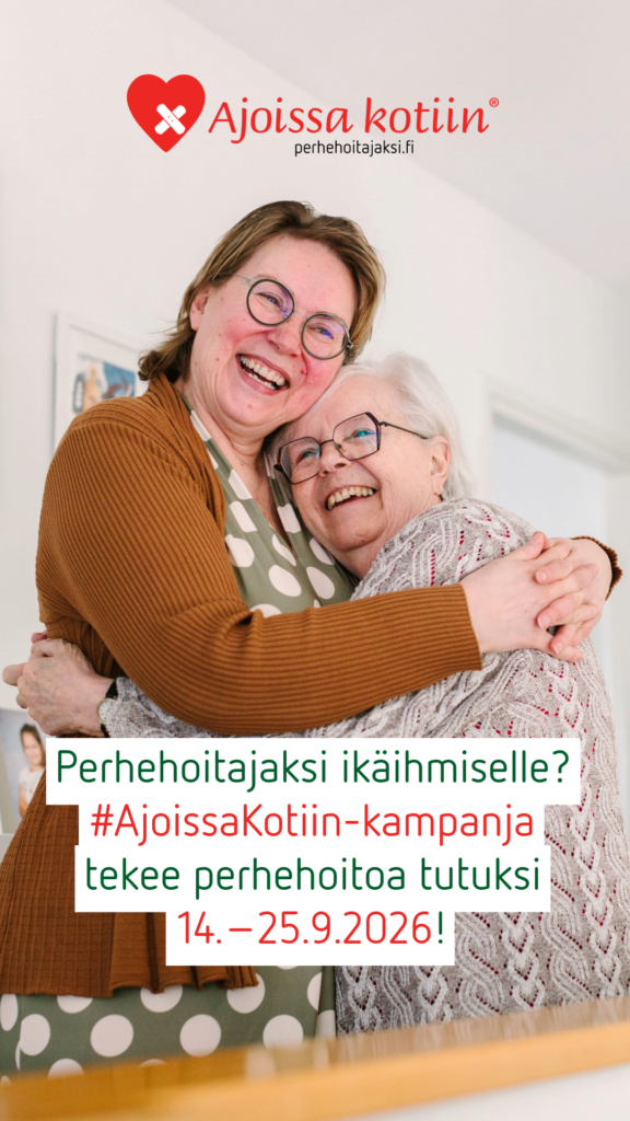 Kaksi silmälasipäistä naista halaa.
