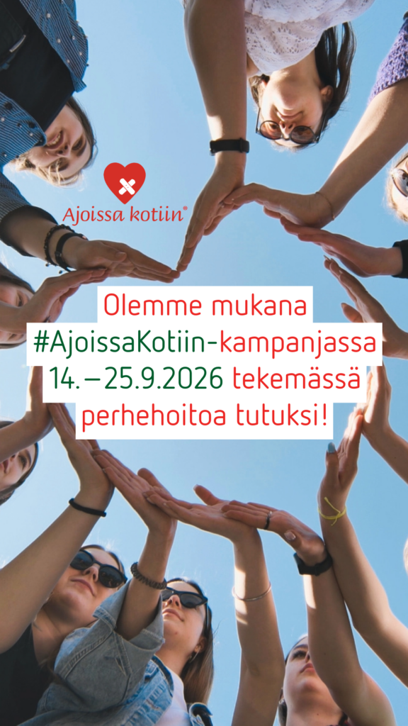 Ryhmä ihmisiä muodostaa käsillään sydämenmuotoisen kuvion ilmaan.